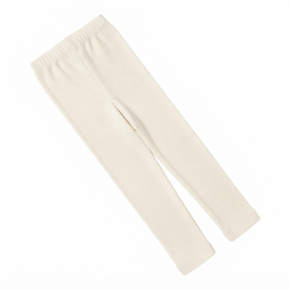 Cream ribbed kids leggings angled view